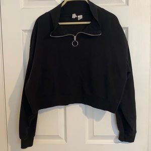 Divided black cropped half zip